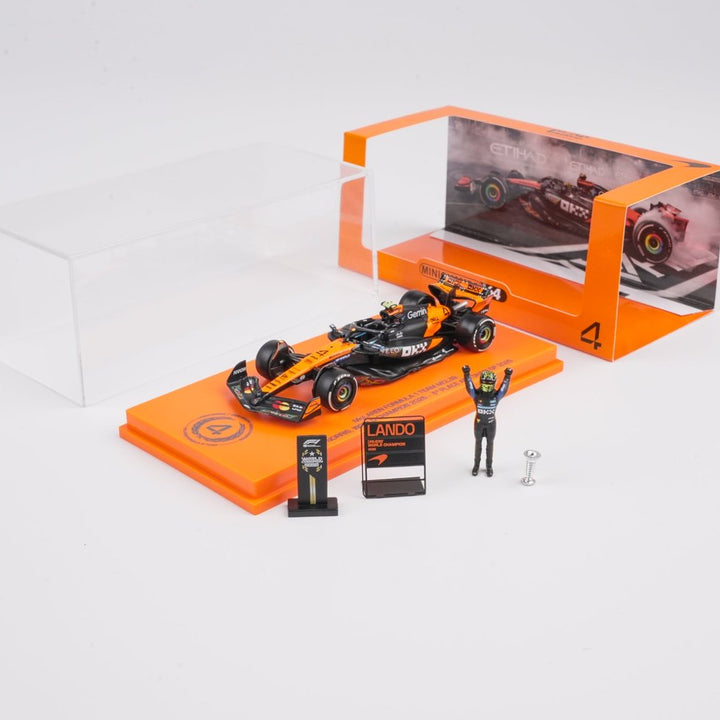 Scale 1:64 Lando Norris Abu Dhabi GP 2025 World Champion McLaren MCL39 With Figurine & Pitboards- 1:64 Minichamps Model Car