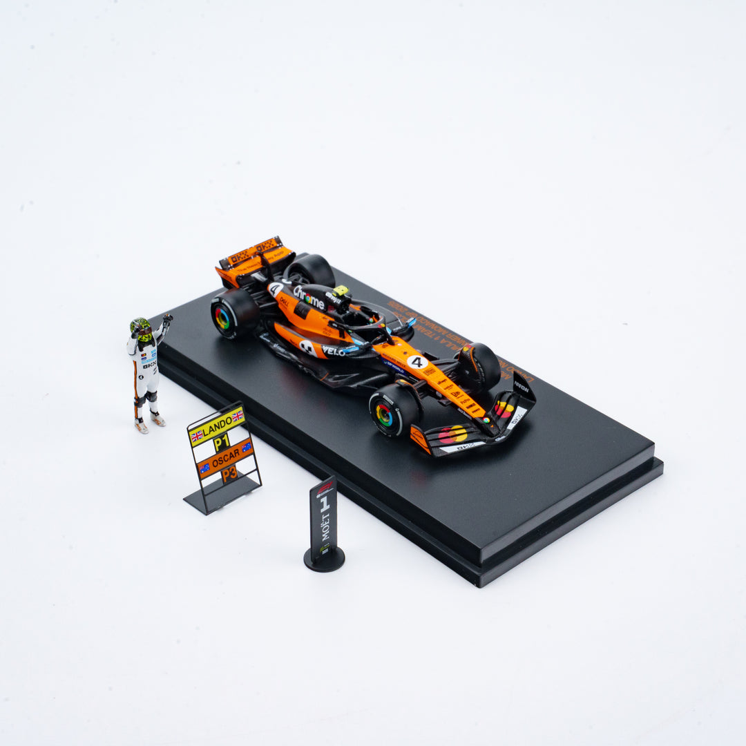 Scale 1:64 Lando Norris Winner Monaco GP 2025 McLaren MCL39 With Figurine &amp; Pitboards- 1:64 Minichamps Model Car