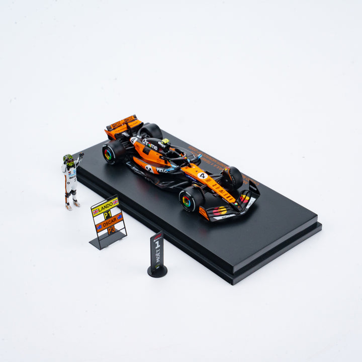Scale 1:64 Lando Norris Winner Monaco GP 2025 McLaren MCL39 With Figurine &amp; Pitboards- 1:64 Minichamps Model Car