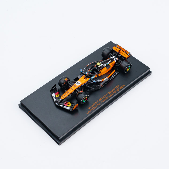Scale 1:64 Lando Norris Winner Monaco GP 2025 McLaren MCL39 With Figurine &amp; Pitboards- 1:64 Minichamps Model Car