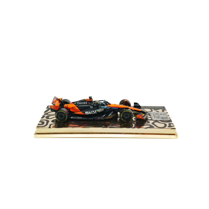 Lando Norris World Champion McLaren MCL39 - Test Abu Dhabi  - 1:64 Minichamps Model Car (Event Special Edition)