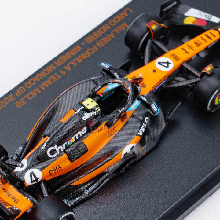 Scale 1:64 Lando Norris Winner Monaco GP 2025 McLaren MCL39 With Figurine &amp; Pitboards- 1:64 Minichamps Model Car